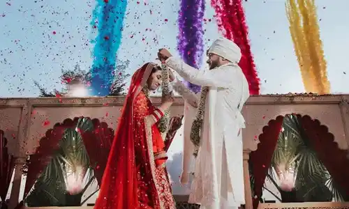 Director managing cinematic pre-wedding shoot